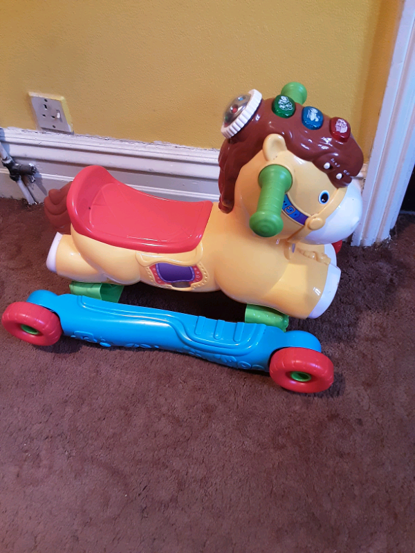 fisher price riding horse on wheels
